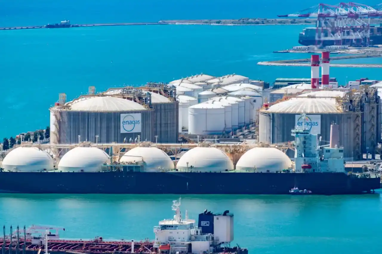 Energy Transition Leadership - LNG infrastructure representing the bridge between traditional and renewable energy